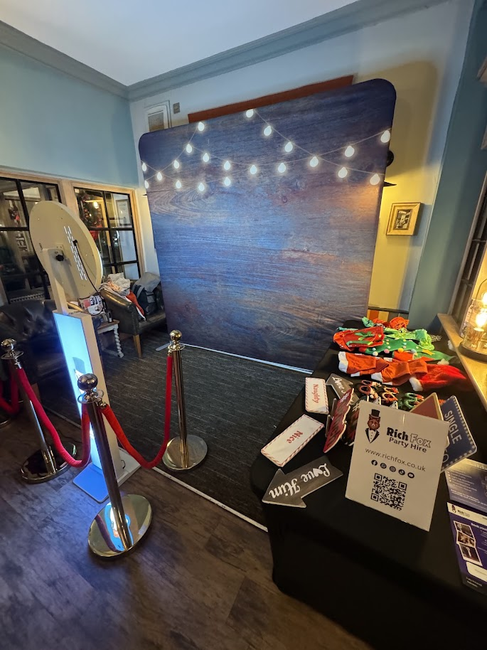Rich Fox selfie photobooth with festive props and Christmas decorations at The Railway in Buxton